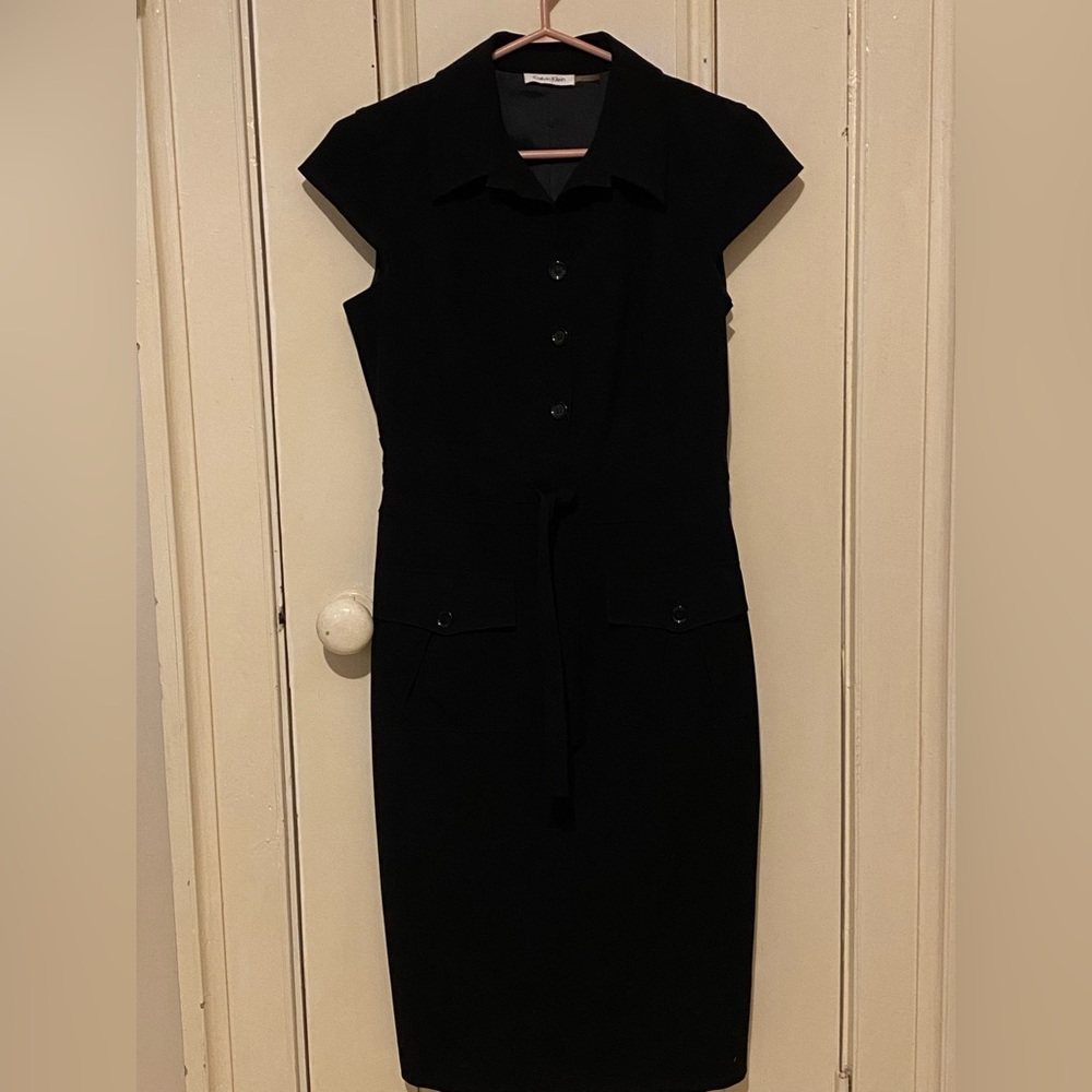 Calvin Klein black dress with front buttons and tie. Size 6